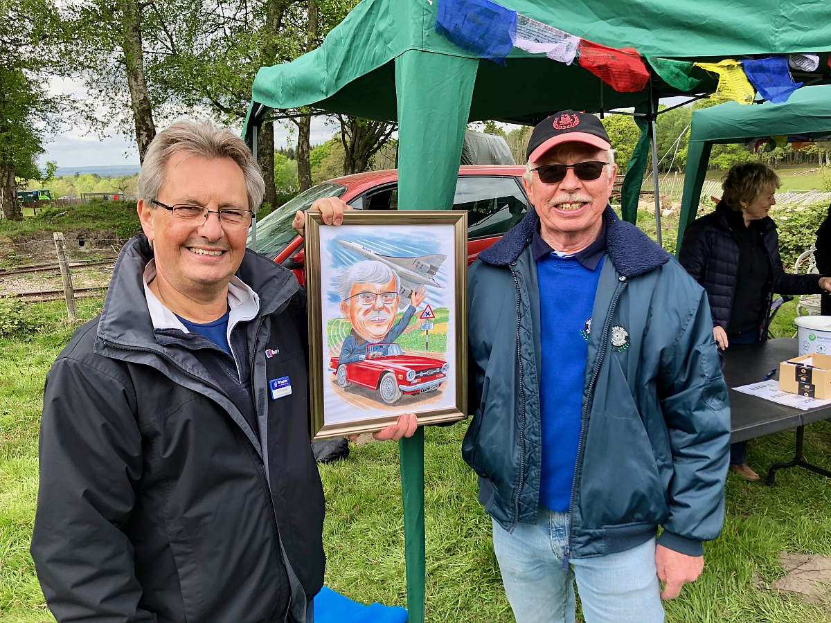 dave-goswell-presents-mervyn-rogers-with-his-cartoon-1200x900.jpeg?v20240716172921