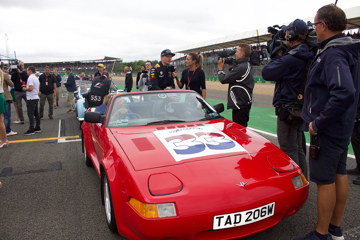 natalie-pinkham-interviews-max-verstappen-perched-on-the-rear-of-phil-horsley-s-grinnall-bodied-tr7v8-1200x800.jpg?v20240716173043